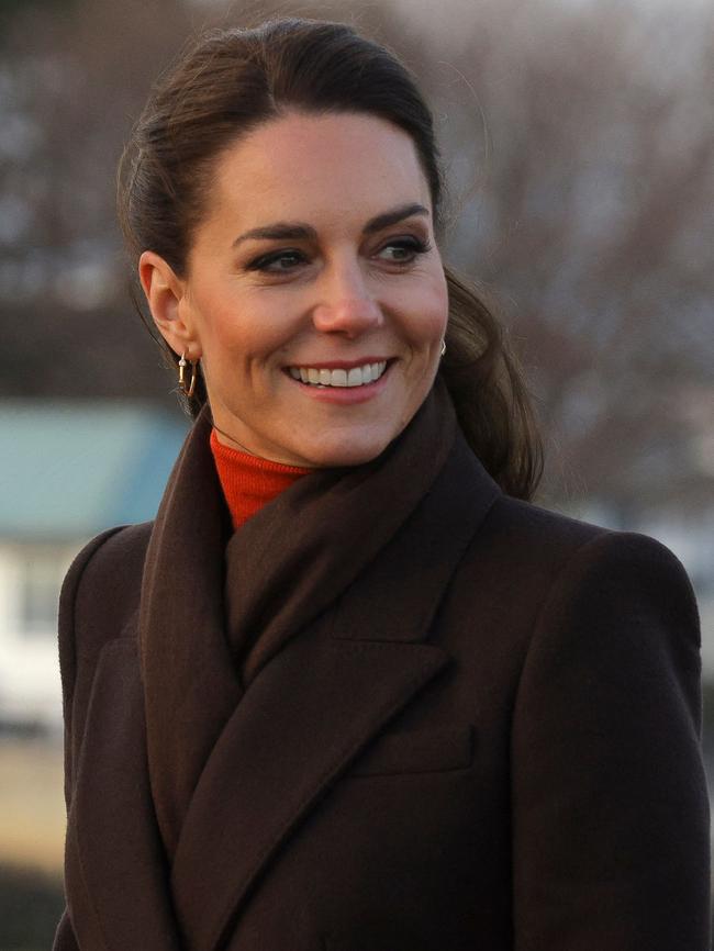 She wore the same orange dress under a coat while in Boston, Massachusetts in December 2022. Picture: Brian Snyder/AFP