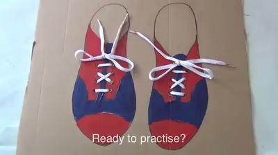 Teaching children to tie on sale shoelaces