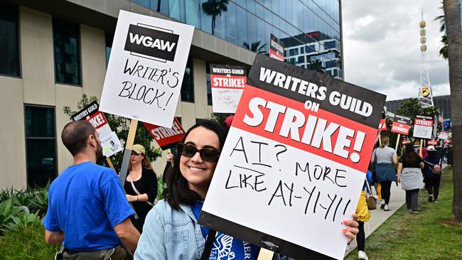 Writer Ilana Pena holds her sign on the picket line on the fourth day of the strike by the Writers Guild of America in front of Netflix in Hollywood. Picture: Frederic J. Brown/AFP