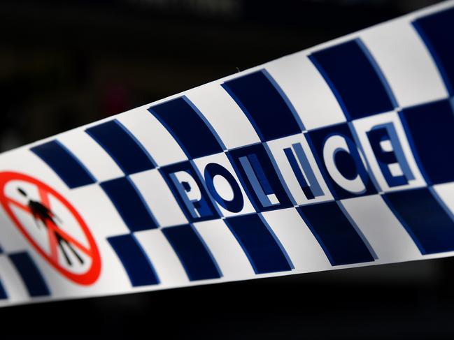 Police tape seen at a crime scene outside Penrith Police Station in Sydney, Thursday, October 3, 2019. A critical incident investigation is underway after a man was shot dead outside a western Sydney police station when he opened fire on officers with a shotgun, injuring one. (AAP Image/Joel Carrett) NO ARCHIVING