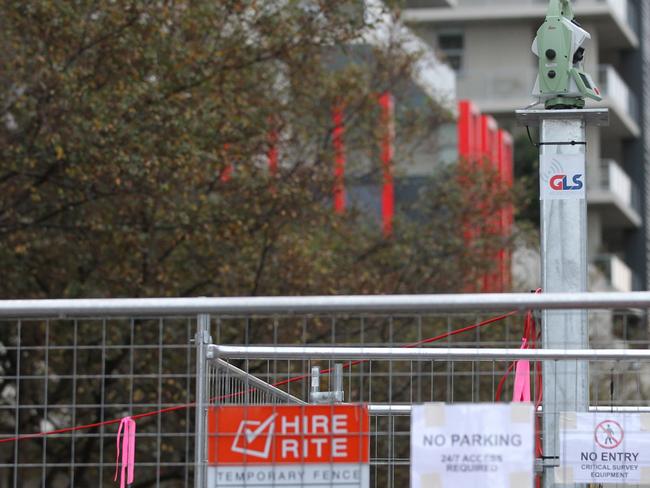 Survey equipment is seen at Mascot Towers in Mascot, Sydney, Thursday, June 20, 2019. Residents of the high-rise in Mascot, in Sydney's inner-south, were evacuated as a precaution after cracks were discovered in the building last week. (AAP Image/Danny Casey) NO ARCHIVING