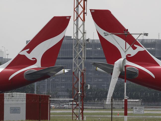 SYDNEY, AUSTRALIA - NewsWire Photos February 25, 2021: QANTAS has reported losses of around 1 billion dollars over the last year, counting the financial cost of Covid-19 on the airline. QANTAS planes are pictured at Sydney Airport today. Picture: NCA NewsWire / David Swift