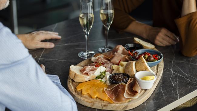 You can share a charcuterie board and paint pots at Kate Victoria Art Studio.