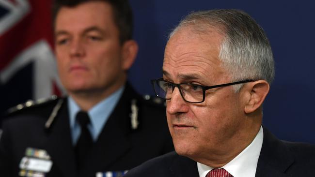 Prime Minister Malcolm Turnbull briefs the media alongside AFP Commissioner Andrew Colvin following the Sydney raids. Picture: AAP