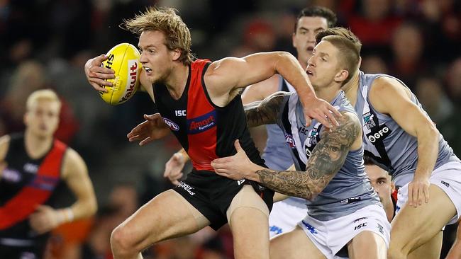 Darcy Parish will be assessed for concussion during the week. Picture: Getty Images