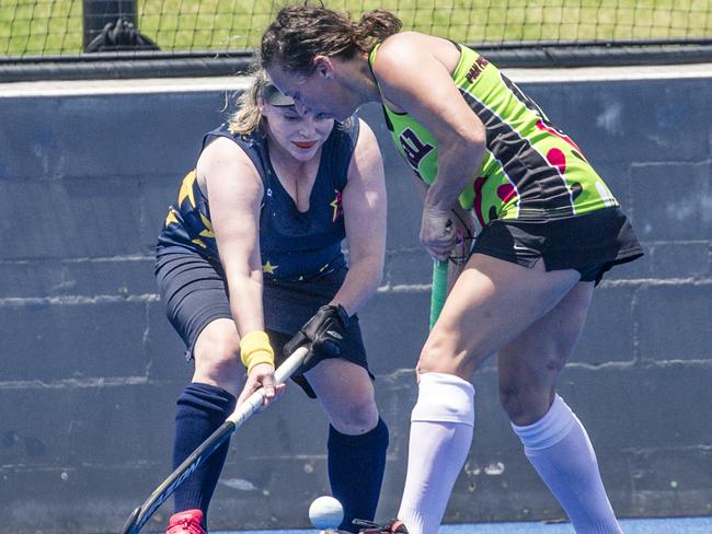 Action in the Pan Pacific Masters Games Hockey tournament. Picture: Glenn Campbell