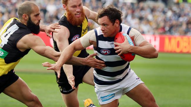 Steven Motlop is chased by Bachar Houli and Nick Vlastuin. Picture: Alex Coppel