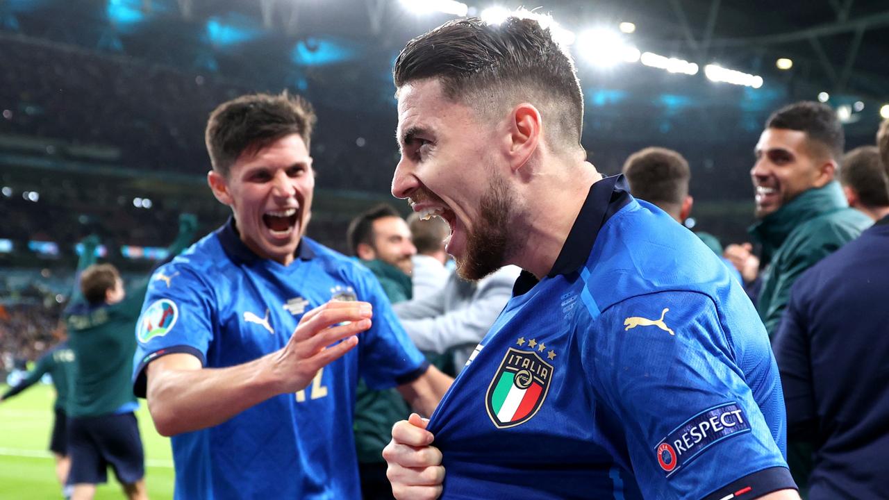 LONDON, ENGLAND - JULY 06: Jorginho of Italy celebrates scoring their sides winning penalty in the penalty shoot out during the UEFA Euro 2020 Championship Semi-final match between Italy and Spain at Wembley Stadium on July 06, 2021 in London, England. (Photo by Carl Recine - Pool/Getty Images)