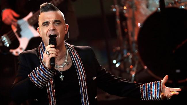 There is speculation Robbie Williams may join his Take That bandmates. Picture: Getty Images