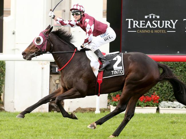 Tinto and the late Tim Bell combine to win the Queensland Oaks in 2014. Picture: Jono Searle