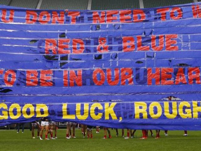 Demons their show support for Jarryd Roughead with a touching banner ahead of the clash against Hawthorn. Roughy.