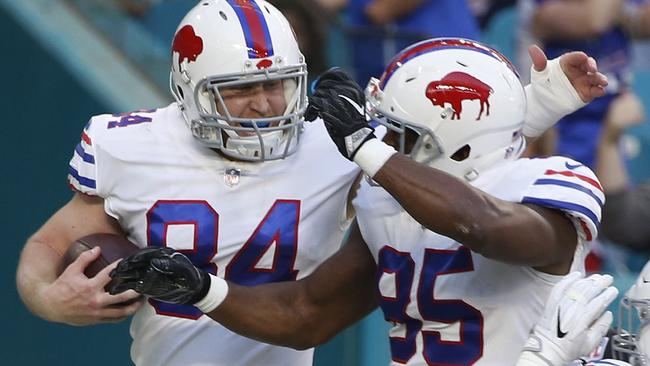 Buffalo Bills tight end Nick O’Leary, left, celebrates his touchdown against Miami. Picture: AP