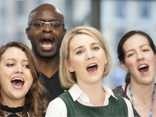 The National Health Service Choir has beaten Justin Bieber to capture Britain's Christmas No.1 song.