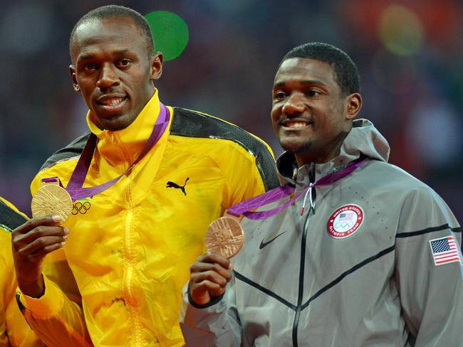 With Justin Gatlin on the podium at the London Olympics.