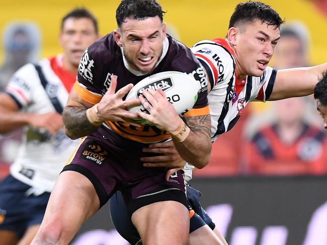 BRISBANE, AUSTRALIA - JUNE 04: Darius Boyd of the Broncos catches a high ball during the round four NRL match between the Brisbane Broncos and the Sydney Roosters at Suncorp Stadium on June 04, 2020 in Brisbane, Australia. (Photo by Bradley Kanaris/Getty Images)