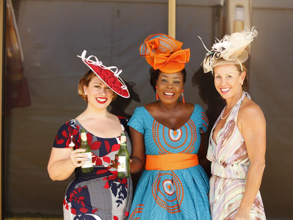 Jessica Dix, Ban Diu and Holly Goodall enjoy the 2019 Darwin Cup. Picture: GLENN CAMPBELL