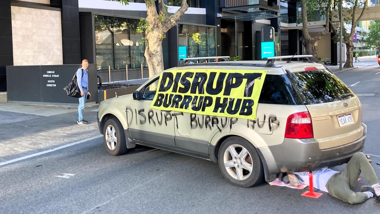 Disrupt Burrup Hub convenes silent protest outside Woodside HQ to call out  VRO's and police repression. — DISRUPT BURRUP HUB