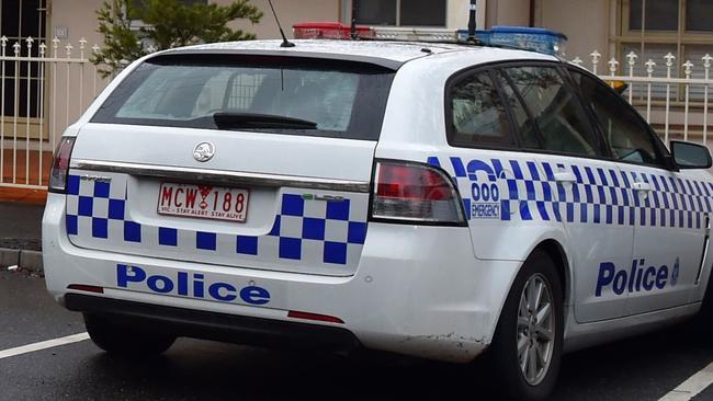 A stolen Mustang has smashed into a police car after a burglary. Picture: Ellen Smith