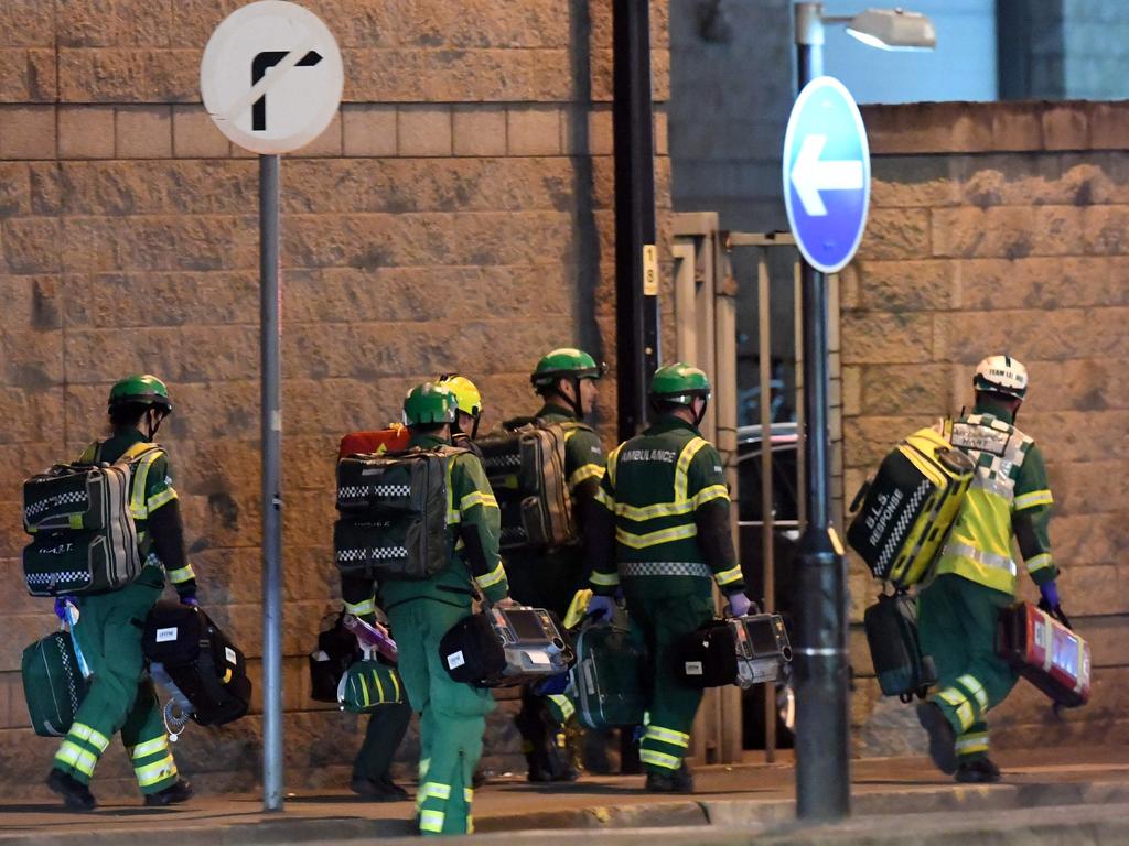 Medics deploy at the scene of a reported explosion during the Ariana Grance concert in Manchester, England. Picture: AFP