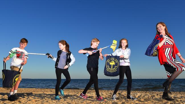 Port Phillip Leader is partnering with Port Phillip Council to get people to pick up litter on beaches and streets. (L-R) Callum (11), Matilda (9), Tully (10), Eliza (10) and Bernadene Voss (mayor). Picture: Josie Hayden