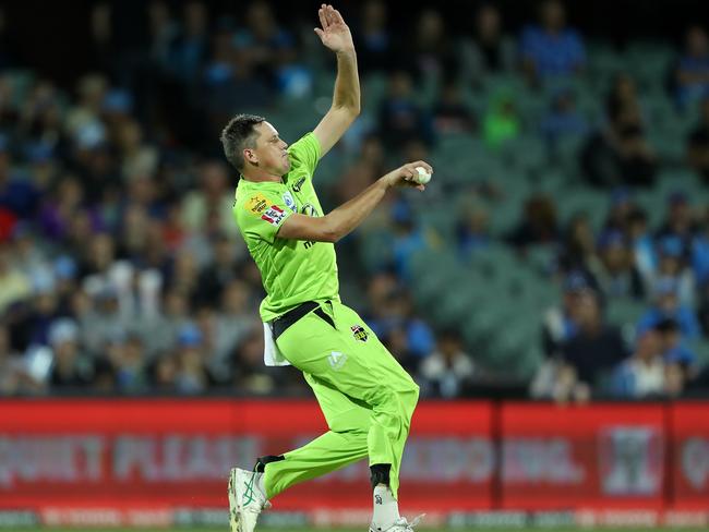 Chris Tremain bowls for the Thunder against the Strikers. Picture: Getty Images