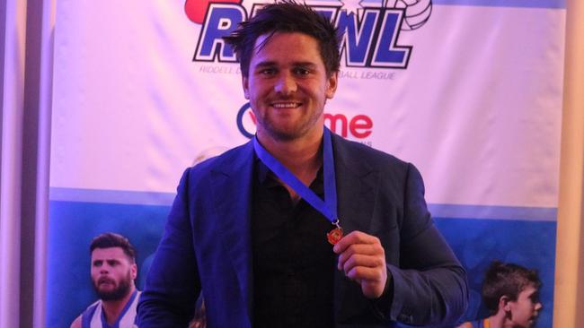 Jesse Davies collects the RDFL Bowen Medal in 2018.