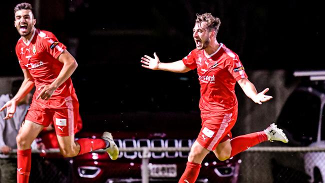 Campbelltown City attacker Marc Marino (right) celebrates in the round one match on Friday night. Picture: Ken Carter