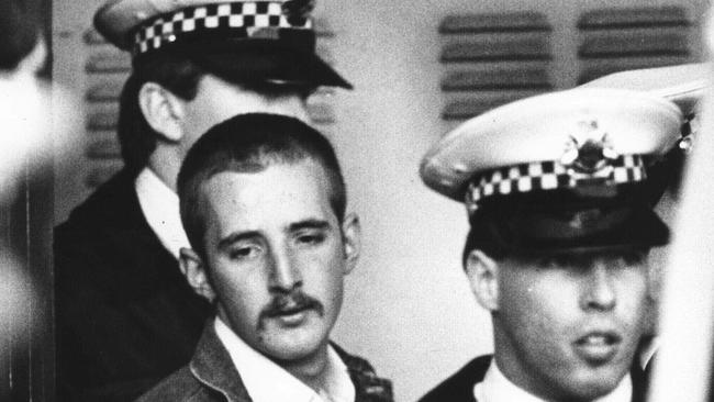 Under heavy police guard, Julian Knight, 19, who shot dead 7 people and wounded 19 in Hoddle Street, Clifton Hill in 1987. Picture: Michael Potter