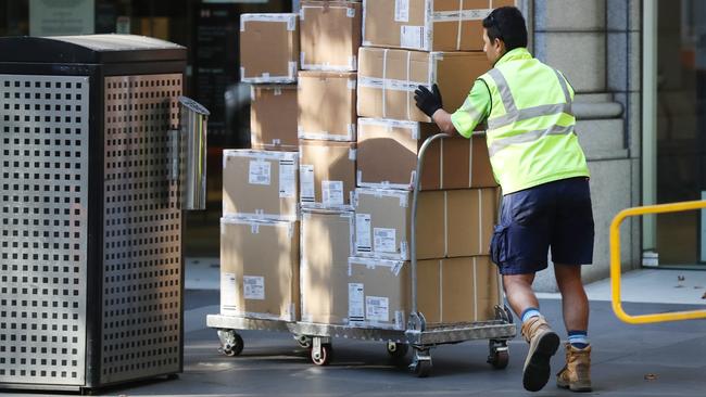 MELBOURNE, AUSTRALIA- NewsWire Photos JANUARY 21, 2021. Economic impacts of the COVID-19 pandemic in Melbourne as the national unemployment data for December is set to be released. A man makes deliveries in Collins Street: Picture: NCA NewsWire/ David Crosling