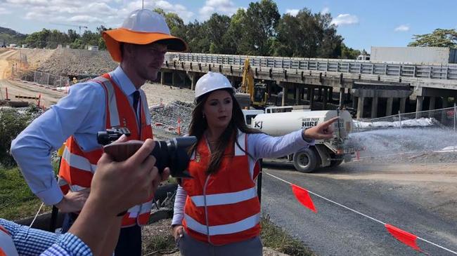 Transport Minister Mark Bailey and Gaven MP Meaghan Scanlon with transport staff on a site tour of M1 upgrades.