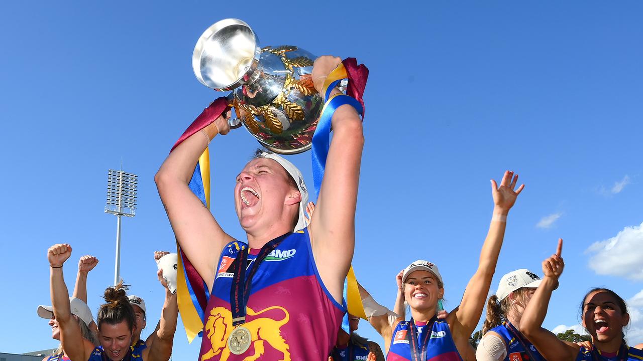 MELBOURNE, AUSTRALIA - DECEMBER 03: Dakota Davidson of the Lions celebrates with the premiership Cup during the AFLW Grand Final match between North Melbourne Tasmania Kangaroos and Brisbane Lions at Ikon Park, on December 03, 2023, in Melbourne, Australia. (Photo by Quinn Rooney/Getty Images)