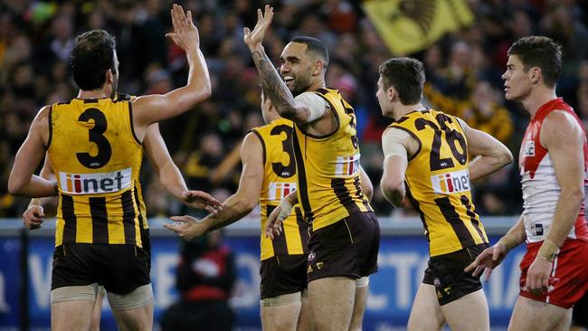 Shaun Burgoyne celebrates a goal with Jordan Lewis in 2014. Picture: Colleen Petch