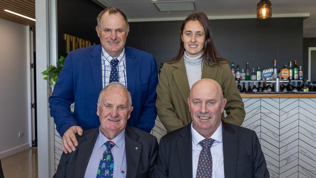 Peter Jolly (bottom left) with sons David (left), Richard (right) and granddaughter Chantelle (top right).