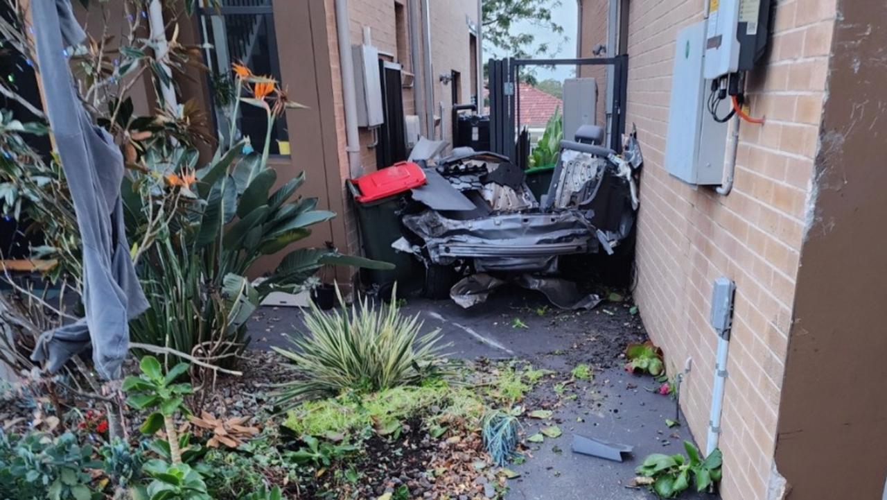 The back end of one of the cars ended up down the side of a house along Old Northern Rd in Baulkham Hills. Picture: NewsWire handout