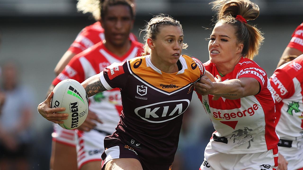 Julia Robinson barges through a tackle. Picture: Brett Costello.