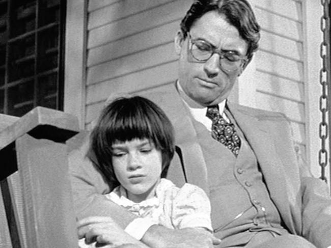 Gregory Peck playing Atticus Finch, and Mary Badham as Scout in To Kill a Mockingbird.