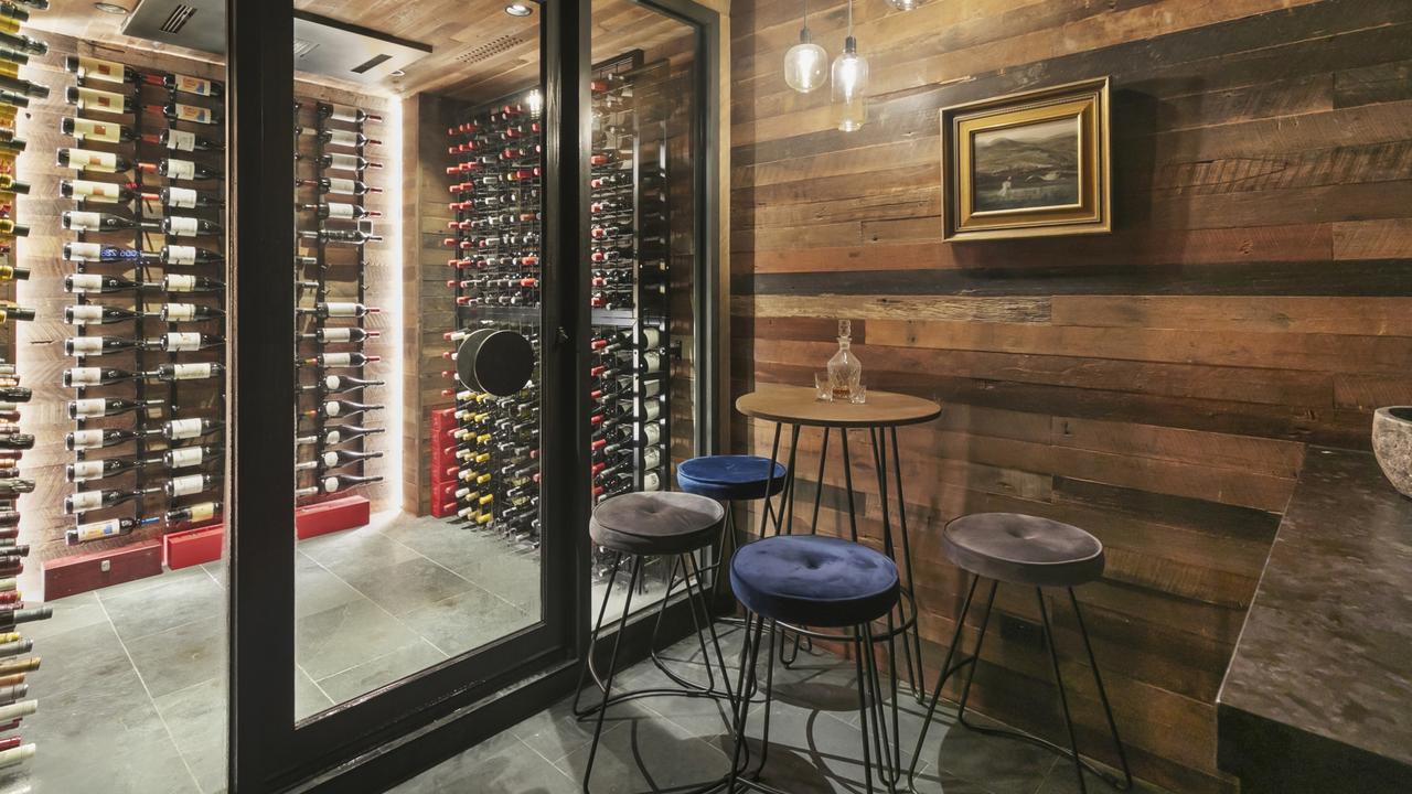 There’s a secret wine cellar and tasting room behind a bookcase.