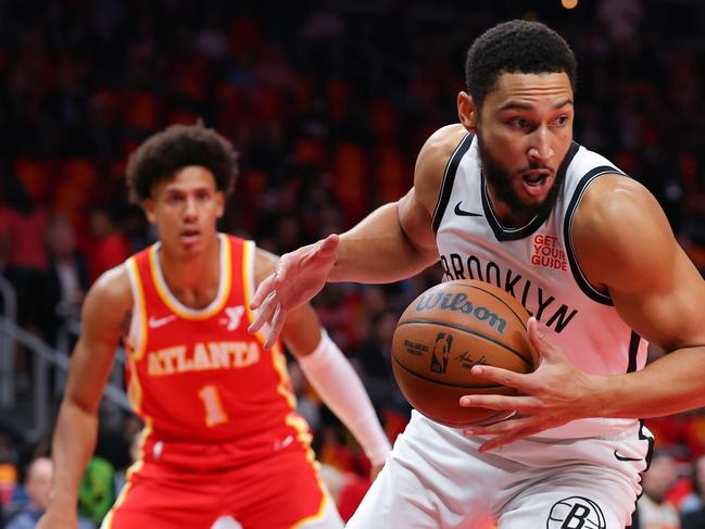 ATLANTA, GEORGIA - OCTOBER 23: Ben Simmons #10 of the Brooklyn Nets picks up a loose ball during the first quarter of the game against the Atlanta Hawks at State Farm Arena on October 23, 2024 in Atlanta, Georgia. NOTE TO USER: User expressly acknowledges and agrees that, by downloading and or using this photograph, User is consenting to the terms and conditions of the Getty Images License Agreement. (Photo by Kevin C. Cox/Getty Images)