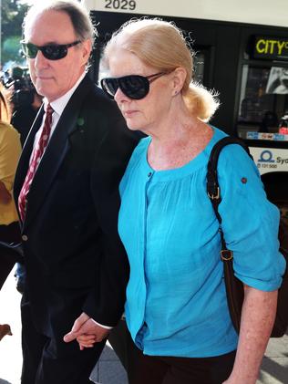 After his first dousing with inmates waste, Robert Hughes tearfully called his wife Robyn Gardiner (above, with Hughes), but the attacks continued. Picture: Toby Zerna