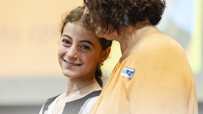 Ramona Hamad after sharing her story as an Iraqi Yazidi on school assembly during Harmony Day celebrations at Darling Heights State School. Picture: Kevin Farmer