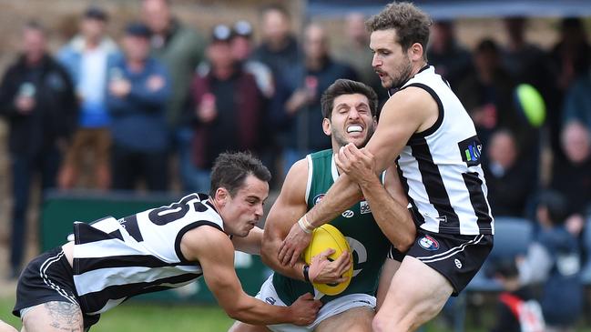 Zac Beadle and Jai Robinson fight with Andrew Stellas earlier this season. Picture: Josie Hayden