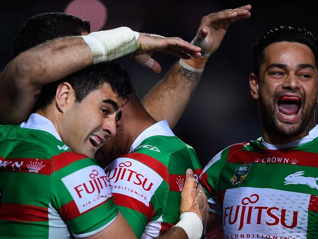 TOWNSVILLE, AUSTRALIA - AUGUST 13: Greg Inglis of the Rabbitohs celebrates after scoring a try during the round 23 NRL match between the North Queensland Cowboys and the South Sydney Rabbitohs at 1300SMILES Stadium on August 13, 2015 in Townsville, Australia. (Photo by Ian Hitchcock/Getty Images)