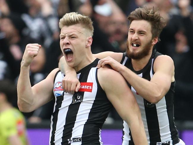 AFL. 2018 AFL Grand Final. 29/09/2018.  West Coast Eagles vs Collingwood at the MCG.  Collingwood's Jordan De Goey celebrates his goal early in the fourth quarter   . Pic: Michael Klein