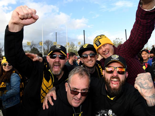 Tigers fans celebrate at Punt Road Oval. Picture: AAP/Joe Castro