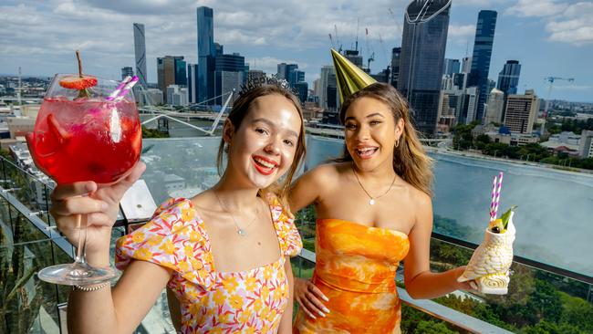 Bridget Cook from Hendra and Genevieve Dunks from Indooroopilly are ready for New Year's Eve at The Emporium, South Bank. Picture: Richard Walker