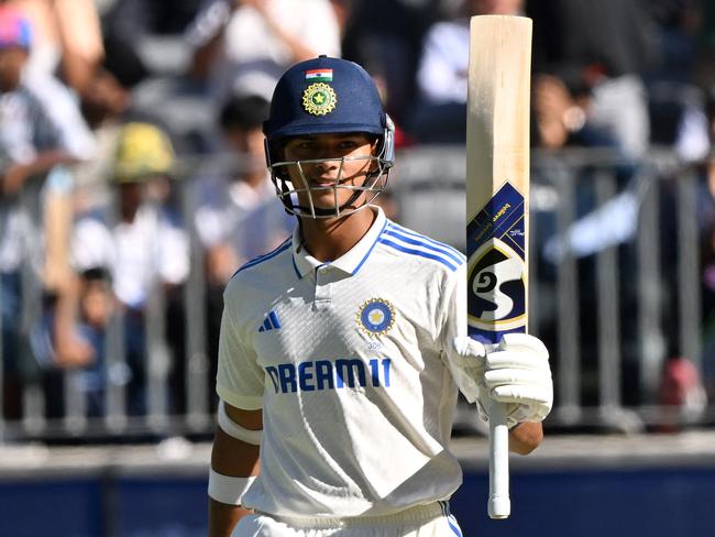 Indiaâs Yashasvi Jaiswal celebrates reaching his half century (50 runs) during the second day of the first Test cricket match between Australia and India at the Optus Stadium in Perth on November 23, 2024. (Photo by SAEED KHAN / AFP) / -- IMAGE RESTRICTED TO EDITORIAL USE - STRICTLY NO COMMERCIAL USE --