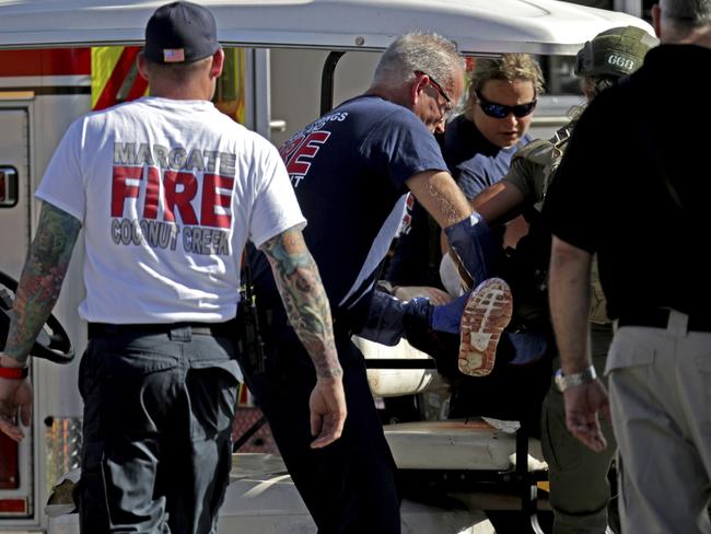 Medical personnel tend to a victim following the horrific shooting in Parkland. Picture: John McCall/South Florida Sun-Sentinel/AP