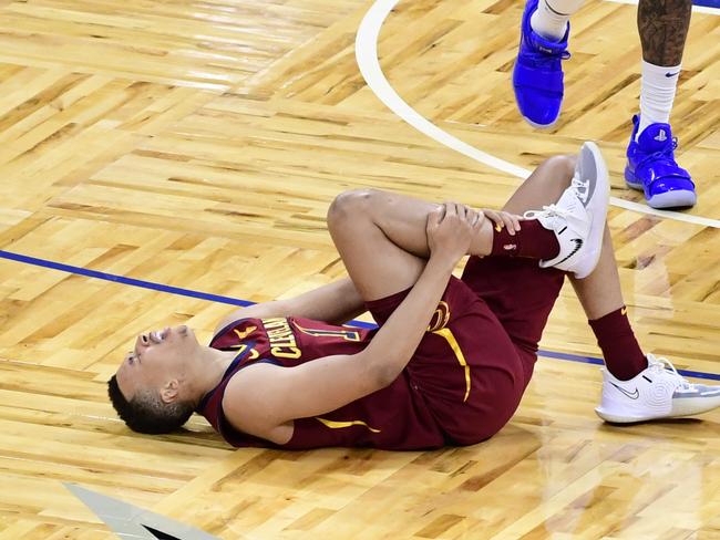 ORLANDO, FLORIDA - JANUARY 04: Dante Exum #1 of the Cleveland Cavaliers reacts to an injury in the first half against the Orlando Magic at Amway Center on January 04, 2021 in Orlando, Florida. NOTE TO USER: User expressly acknowledges and agrees that, by downloading and or using this photograph, User is consenting to the terms and conditions of the Getty Images License Agreement. (Photo by Douglas P. DeFelice/Getty Images)