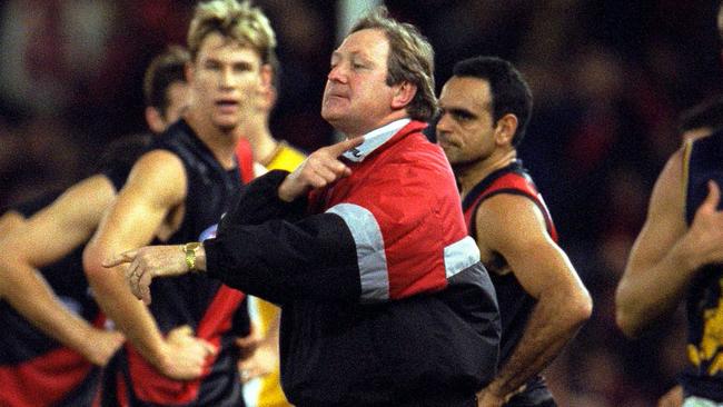 Coach Kevin Sheedy drawing finger across his throat gesturing angrily at Mitchell/White after second quarter incident.ALF football - Essendon vs West Coast Eagles match at Colonial Stadium in Melbourne 17 Jun 2000. (NB: Mandatory Credit: Darren McNamara ALLSPORT