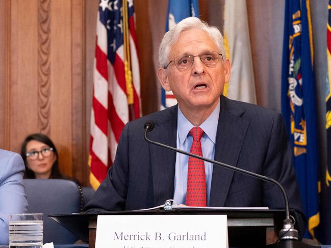 TOPSHOT - US Attorney General Merrick Garland speaks at the beginning of a meeting of the Justice Departmentâs Election Threats Task Force at the Justice Department in Washington, DC on September 4, 2024. The US indicted two employees of Russia's RT and imposed sanctions on top editors of the state-funded news outlet, accusing them of seeking to influence the 2024 US presidential election. Garland, chairing the meeting, said two Russia-based RT employees have been indicted in New York for money laundering and violating the Foreign Agents Registration Act. (Photo by ROBERTO SCHMIDT / AFP)